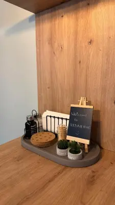 a table with a cake and a sign on a table at Urban Hive - Central Designer Studio in Lozenets in Sofia
