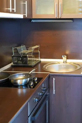 a kitchen with a sink and a counter top at Pirin Elegance Apartment by Gondola Lift in Bansko