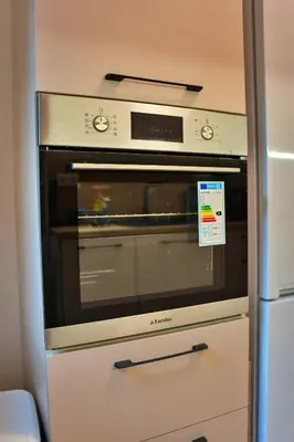 a kitchen oven with a sign on it at The Heart of Sofia just steps away from Vitoshka in Sofia