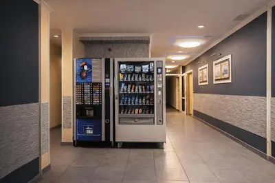 a vending machine in the hallway of a store at N9 Studentski Loft - Cozy Apt with Private Parking in Sofia