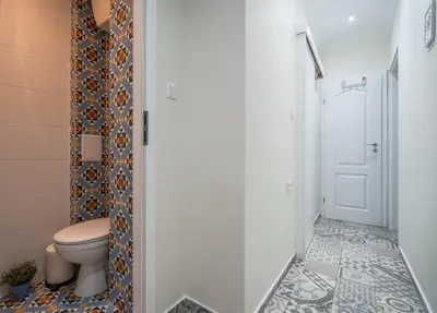 a bathroom with a toilet and a shower at Stylish & Funcional 1 BDRM apt in Sofia's heart in Sofia
