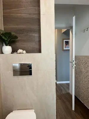 a bathroom with a toilet in a room at Kate House in Sofia