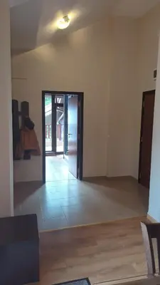 a room with a hallway with a door and a floor at Borovets Apartments, Flora Violet Residence in Borovets