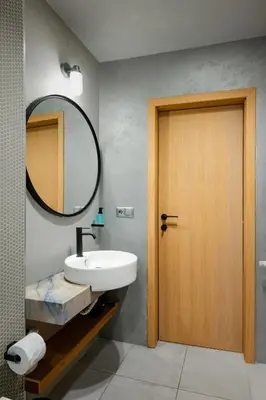 a bathroom with a sink and a mirror at Cozy Apartment in Lozenetz by 7th Sence in Sofia