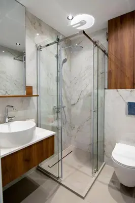 a bathroom with a shower and a sink and a toilet at Alta Vita - Brand New - Luxury - Parking - Wash&Dry - Gas Heating in Sofia