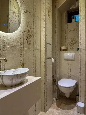 a bathroom with a sink and a toilet at Heart of Sofia Apartment in Sofia