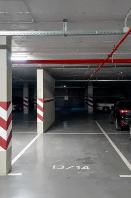 an empty parking garage with cars parked in it at Beni Deluxe in Plovdiv