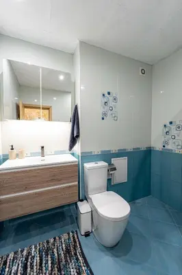 a bathroom with a toilet and a tub and a sink at Beni Deluxe 1 in Plovdiv