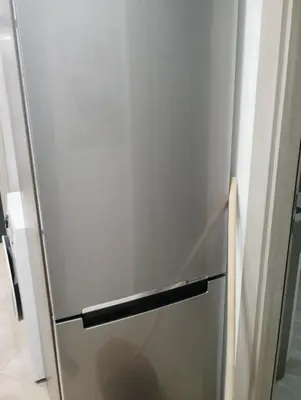 a stainless steel refrigerator in a kitchen at Apartment With Free Parking - Center Plovdiv in Plovdiv
