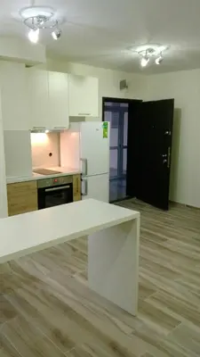 a kitchen with a white counter top in a room at Sofia escape in Sofia