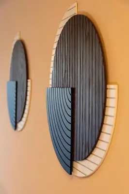 two mirrors on a wall with an accordion at Warm and Spacious 1BR Apt - Brownie in Plovdiv