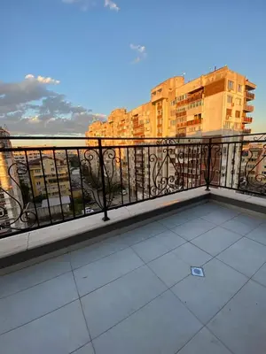 a balcony with a view of a city at Beautiful 2BD Apartment with Large Terrace and Free Parking in Plovdiv