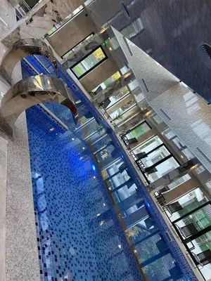 an overhead view of a swimming pool in a building at Devin River in Devin