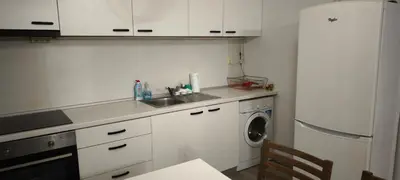 a kitchen with a sink and a washing machine at Two-Bedroom Apartment Lauta Park 6 Plovdiv in Plovdiv