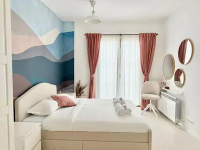 a bedroom with a bed and a large window at Sofia 3-Bedroom Mountain Family Apartment with Free Parking in Sofia