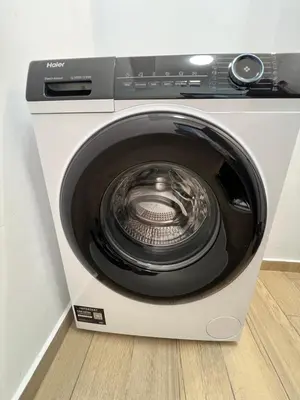 a white washing machine with its door open at Marrakech Central 2BDR w Huge Terrace near Serdika in Sofia