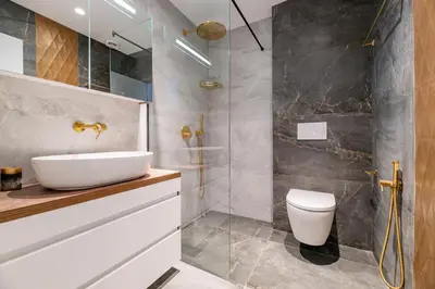 a bathroom with a sink and a shower at NOVITA Hotel Sofia FREE UNDERGROUND PARKING in Sofia