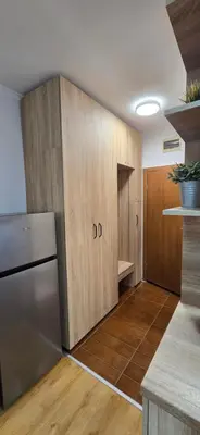 a kitchen with a cupboard with the letter d on it at Lux Apartment B11 in Bansko