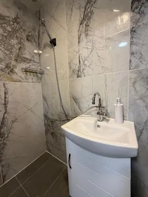 a bathroom with a sink and a shower at Botev MiniHub Hub 1 Modern Studio at Botev 88 in Sofia