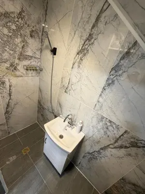 a bathroom with a sink and a shower at Botev MiniHub Hub 1 Modern Studio at Botev 88 in Sofia