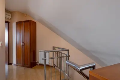a staircase with a metal railing and a stair case at Flower garden in Lozenetz by 7th Sence in Sofia