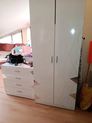 a large white cabinet in a living room at Аppartment Dreams in Pamporovo