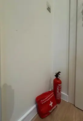 a fire hydrant and a red bag in a room at Apartment Alex in Borovets