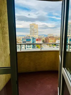 a view of a city from a window at Urban Glow Apartment near Metro Station in Sofia