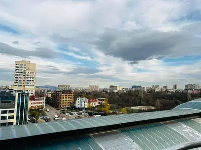 a view of a city from the roof of a building at Urban Glow Apartment near Metro Station in Sofia