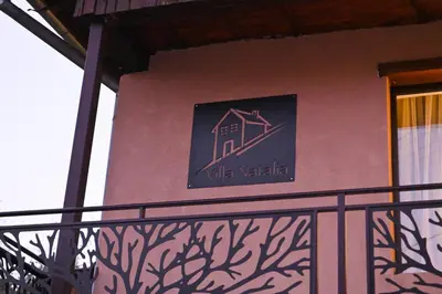 a sign on the side of a building at Villa Natalia in Kremen