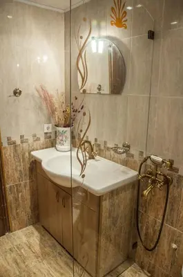 a bathroom with a sink and a shower at Мандулова Къща in Koprivshtitsa