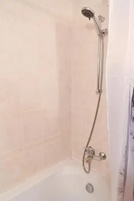 a shower in a bathroom with a tub at Aspen Resort Studio Cozy & Fully Equipped by Flat Manаger in Bansko