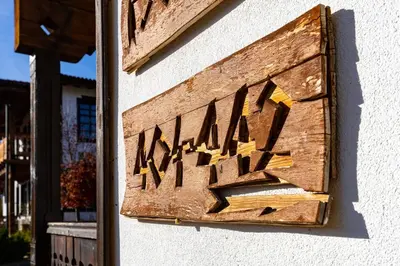 a sign on the side of a building with the word mavis at Vacation Home in Starosel Resort in Starosel