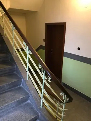 a set of stairs leading up to a door at Апартамент 21 in Sofia