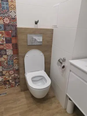 a bathroom with a white toilet in a room at West Park in Sofia