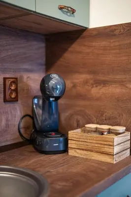 a coffee maker sitting on top of a counter at 400m from Ski lift Belvedere Apartment - SPA - Free parking in Bansko