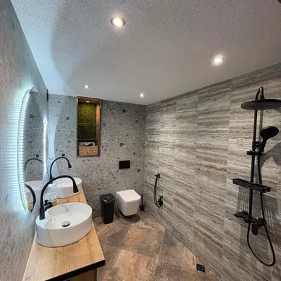 a bathroom with a sink and a toilet at Loft Chalet Bansko in Bansko