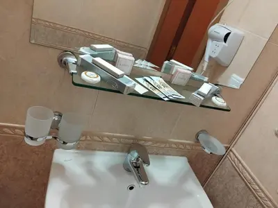 a bathroom with a sink and a mirror at Ski point in Pamporovo