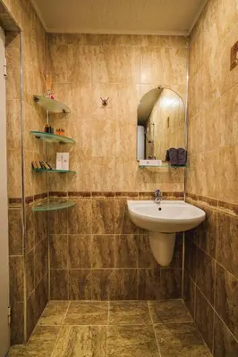 a bathroom with a sink and a mirror at Fantasy in Bansko