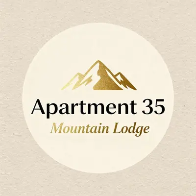 a white sticker with a mountain logo on it at Apartment 35 Mountain Lodge Pamporovo in Pamporovo