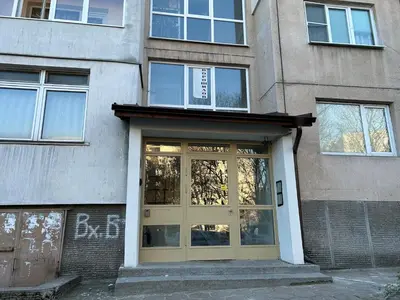 a door to a building with a building at Flat in Darvenitsa near Church St George the Victorious in Sofia