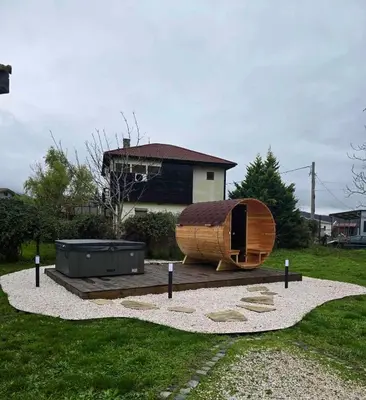 a large wooden boat sitting on top of a yard at RhodoNest in Kara Agach