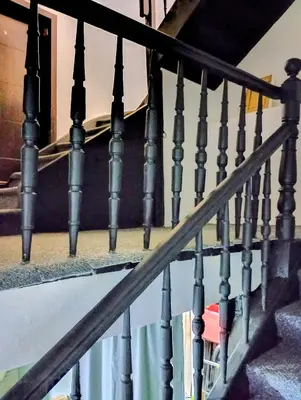 a staircase with metal railings and a ramp at GuestHouse5 KARMA369 in Plovdiv