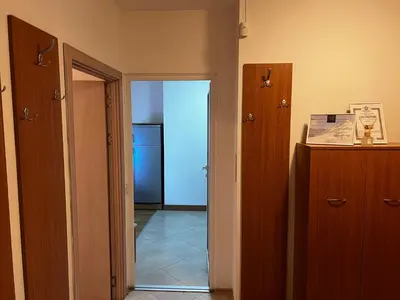 a hallway with a door leading to a room at Lucky Star Bansko Next to the Ski Lift with FREE Parking in Bansko