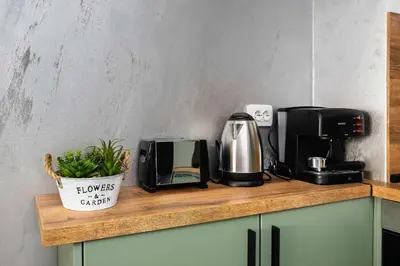 a counter with a coffee maker and a coffeemaker at Stylish 1 Bedroom Apartment - Quiet & Comfortable in Sofia