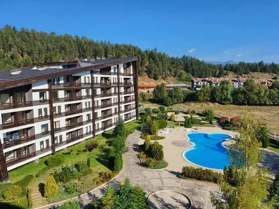 an aerial view of a resort with a swimming pool at AspenValley Aprtment in Razlog