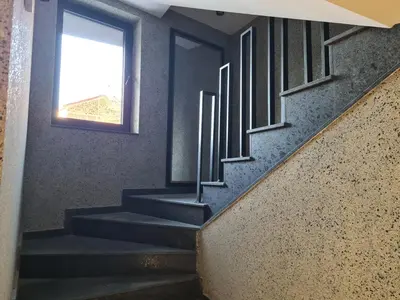a staircase in a building with a window at Plovdiv Hills Apartments with FREE Parking in Plovdiv