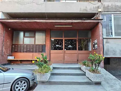 a car parked in front of a building at Apartment M 1 in Plovdiv