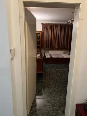an open door to a bedroom with a bed at EAST Spacious and Comfort Apartment in the best suburb in Sofia in Sofia