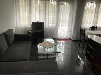 a living room with a couch and a coffee table at EAST Spacious and Comfort Apartment in the best suburb in Sofia in Sofia